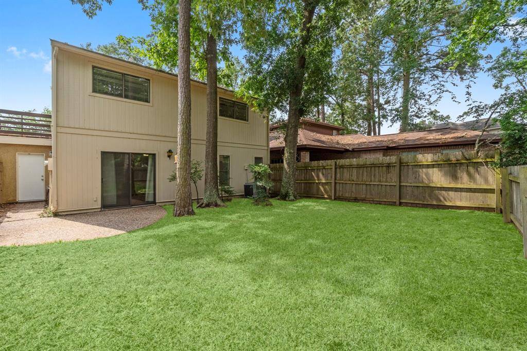 Enjoy peace and privacy in the fully fenced backyard, which backs directly onto a lush greenbelt.