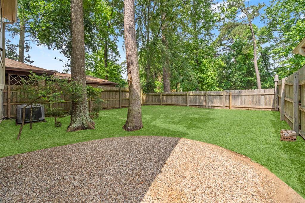 With no rear neighbors, this outdoor space offers a serene setting for relaxing, playing, or entertaining.