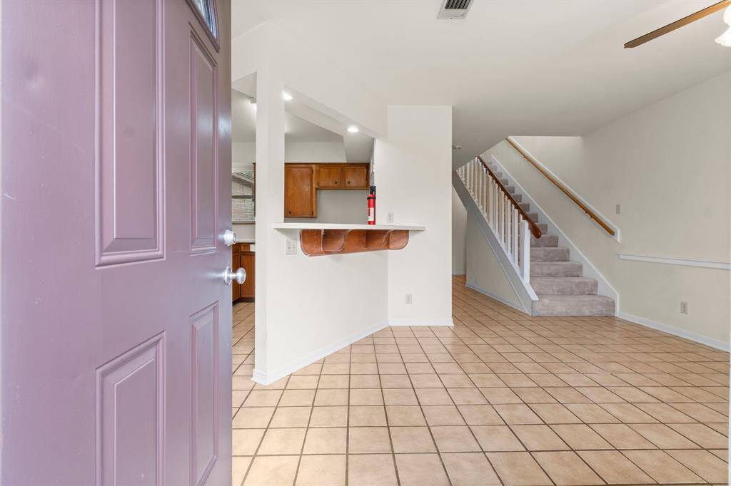 Stepping through the front door in to the downstairs Dining room and Kitchen.