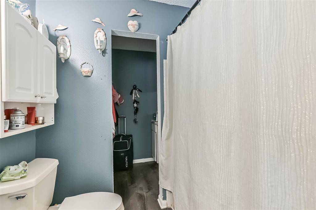Primary bathroom with walk in closet