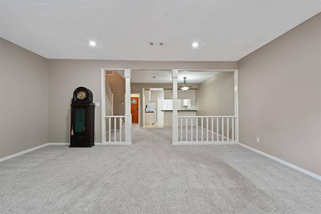 View of LIVING & DINING ROOM from french doors.