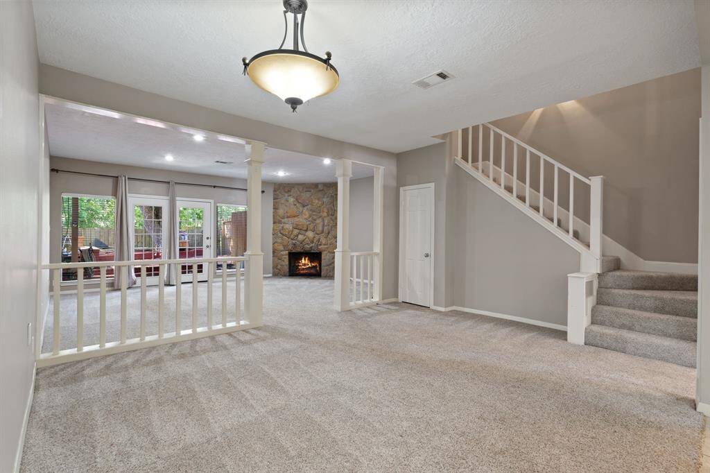 View from dining room looking towards living area.  Under the staircase is a nice closet for storage.  Very convenient!