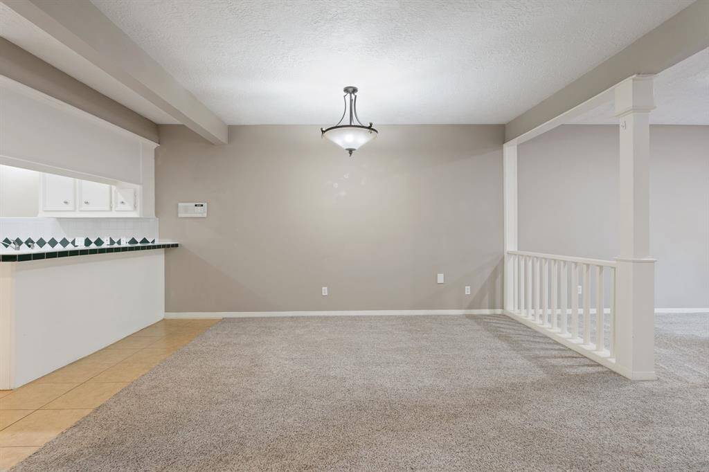 BREAKFAST BAR & spacious DINING ROOM.
