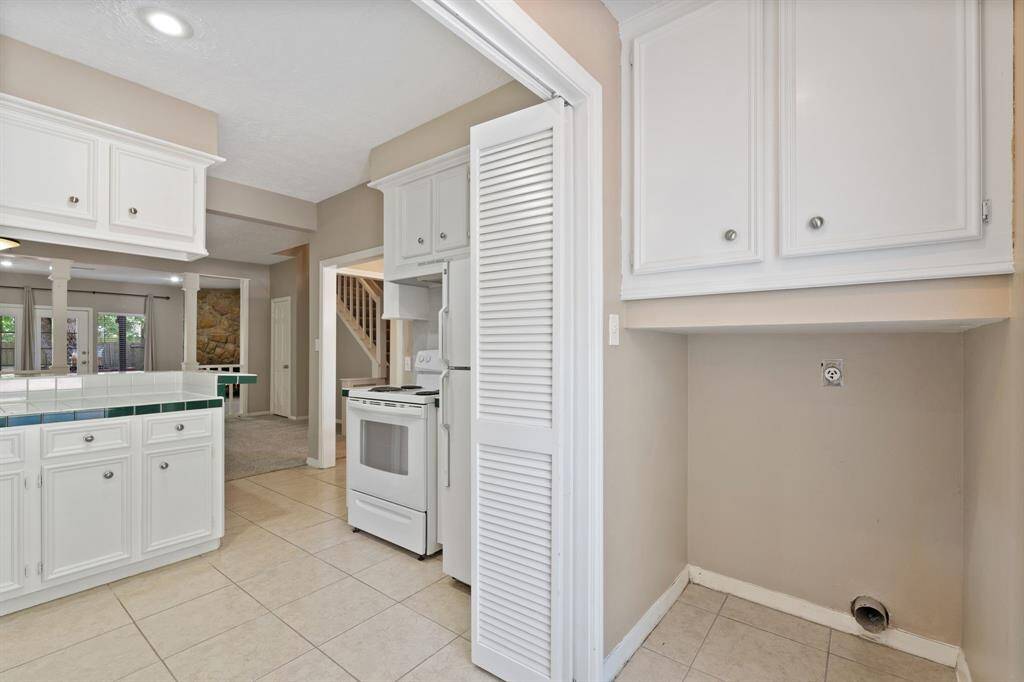 FOLDING DOORS allow you to close off the Laundry Room from the Kitchen