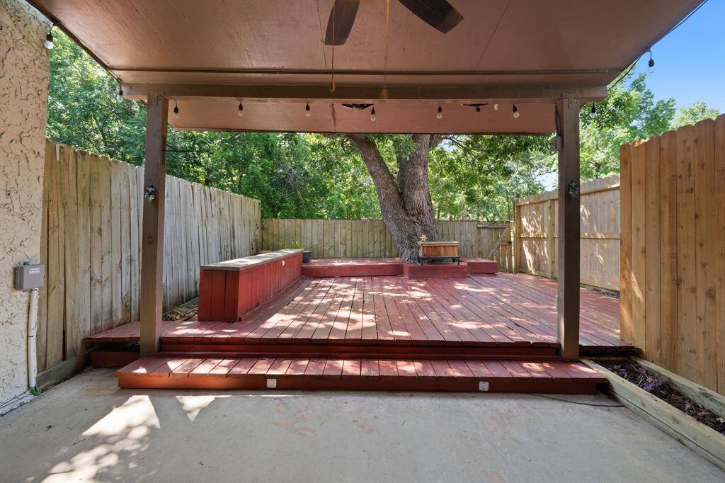 Enjoy the large COVERED BACK PORCH on sunny or rainy days.