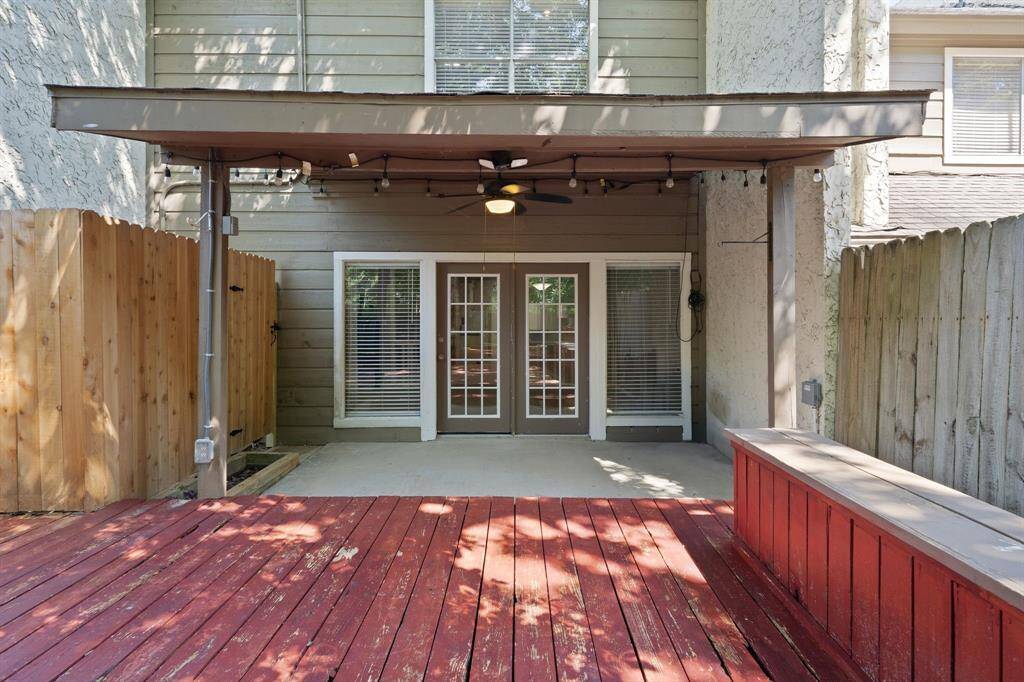 Expansive back deck with built-in seating.