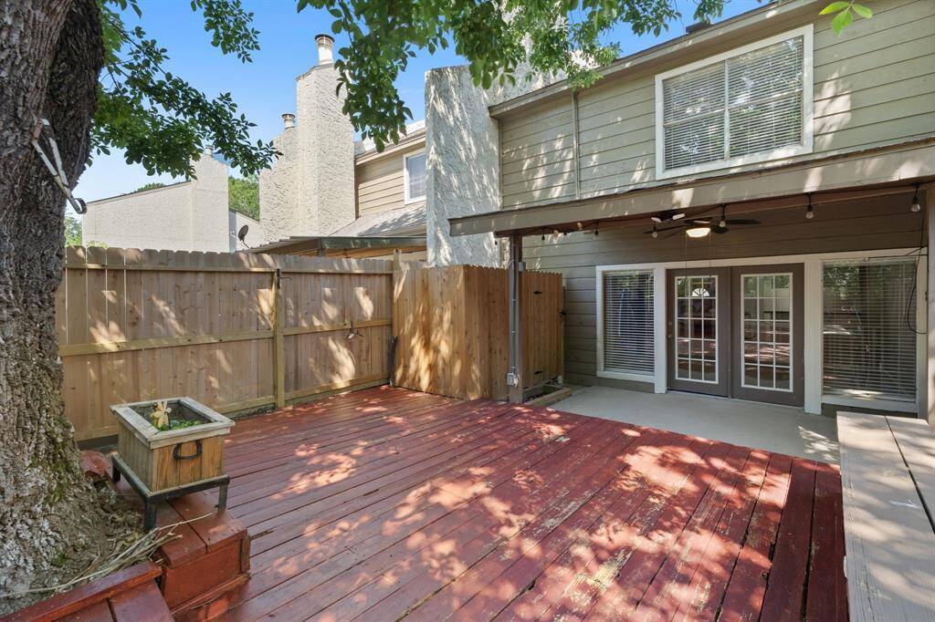 Another magnificent view of this back porch and deck.  It is a backyard oasis with this beautiful MATURE OAK TREE.