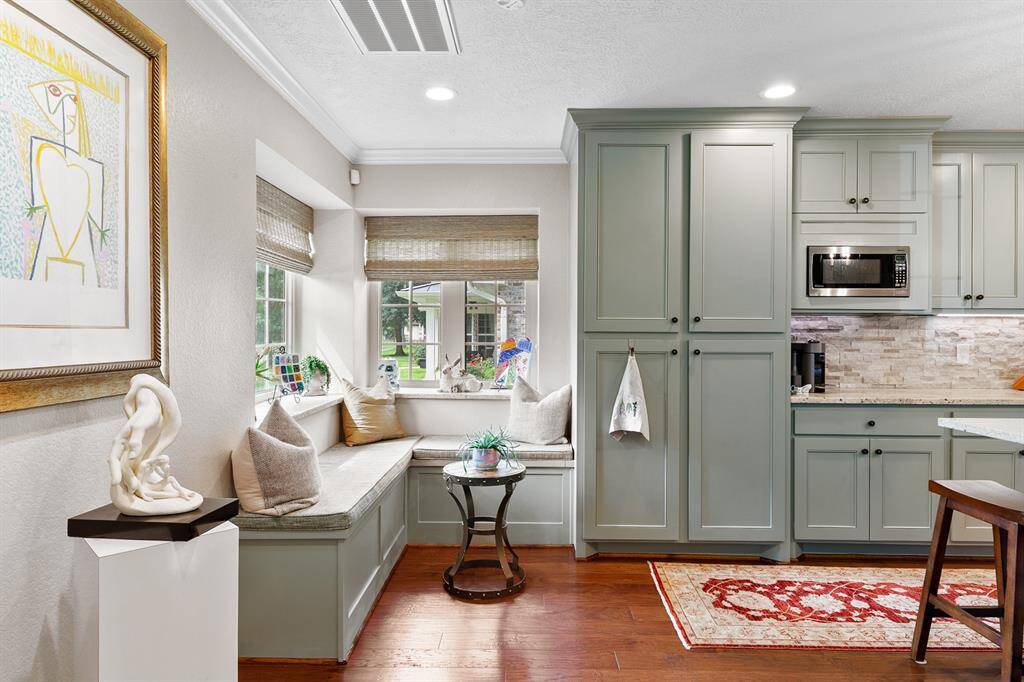 The Sellers incorporated cozy corner banquette seating that maximizes lovely views of the front of the property.