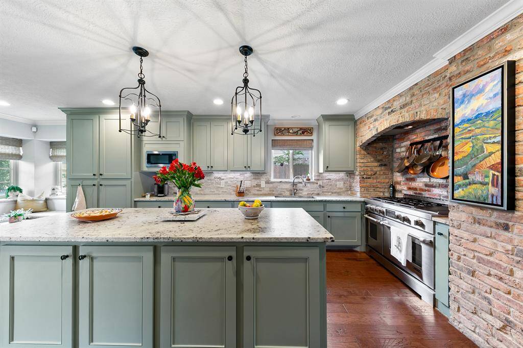With an eye for detail, the Sellers installed a spice rack pull out on the side of the range!  Ample storage that includes the island cabinets.