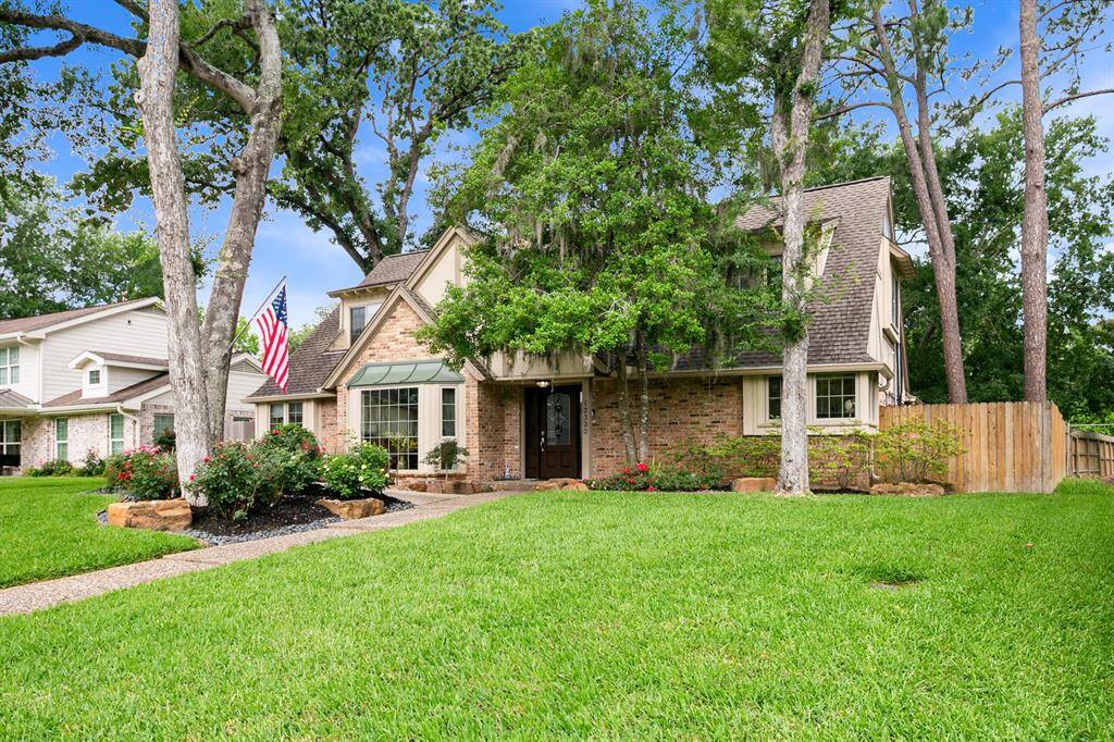 This sweet home is located on Lanny Lane, a picturesque tree-lined street tucked in the back of Ashford Forest Lake, in the heart of the Energy Corridor.