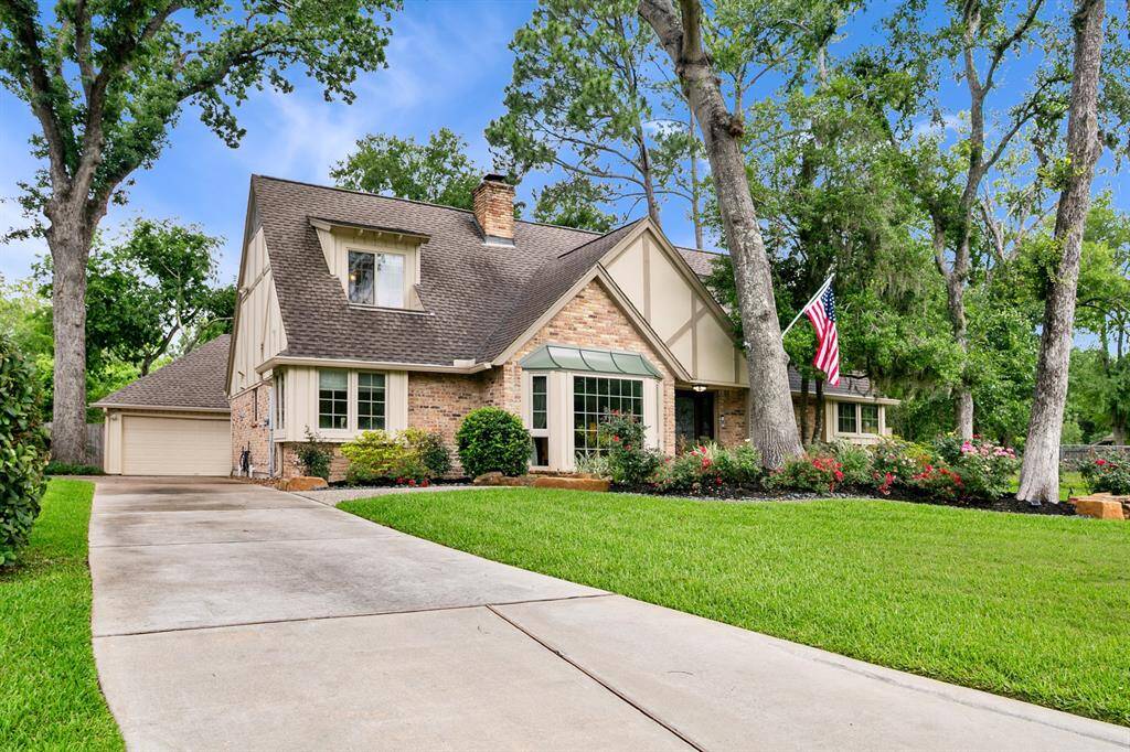 Beautiful elevation! As part of a complete renovation in 2018, the driveway and roof were replaced.