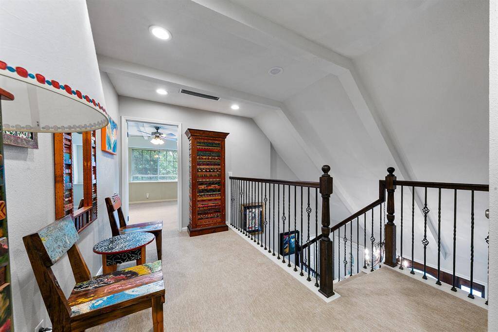 Second story with large landing!  In 2018 Sellers updated stairway handrails and balusters.