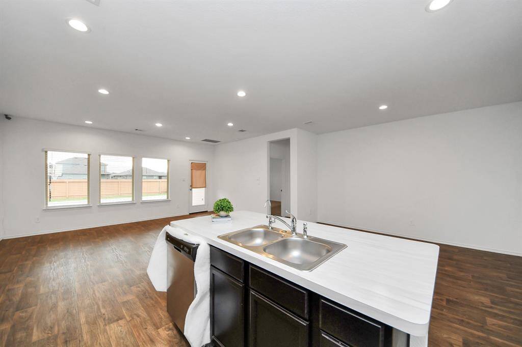 This photo showcases the utility room inside the property.