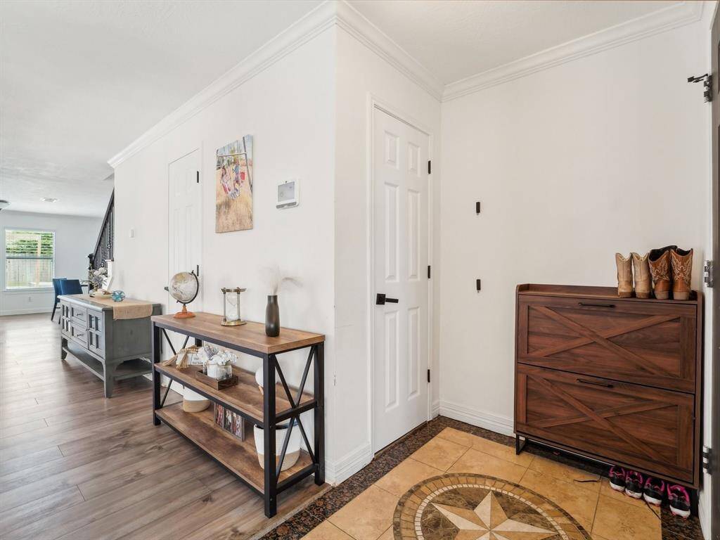 The Entry finds a snazzy tiled floor with star inlay. So pretty!