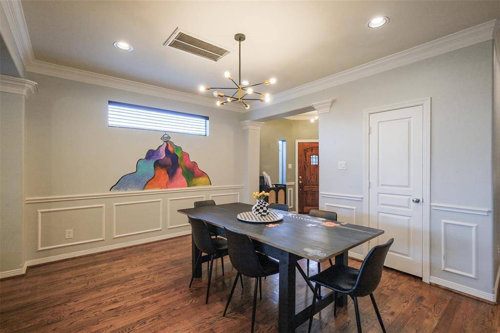 The dining room is next to the kitchen. Additional storage in this area too.