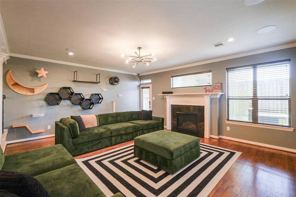 This fab space benefits from a gas fireplace and loads of natural light.