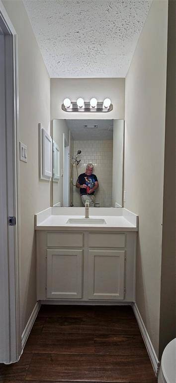 Hall bath with Quartz counter and new Brushed Nichol Faucet.