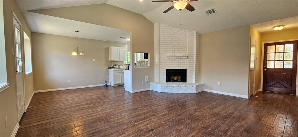 Den to Dining area and entry.