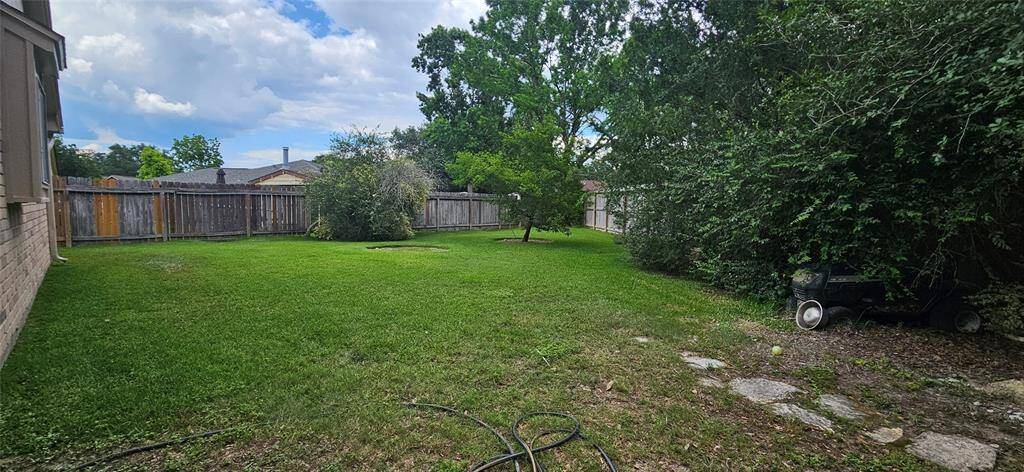 A gigantic area you can store a trailer, small boat or other outdoor items you would usually need a storage lot for!
