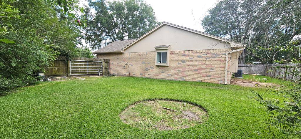 A gigantic area you can store a trailer, small boat or other outdoor items you would usually need a storage lot for!