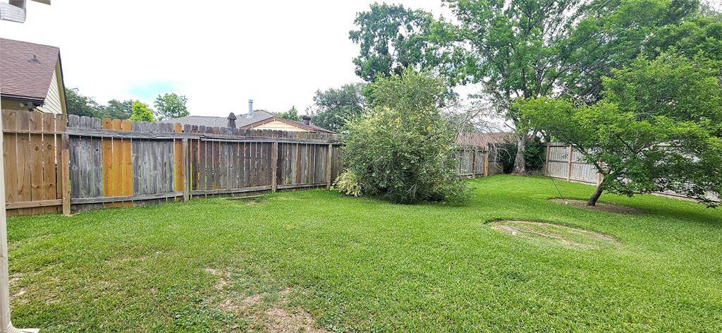 A gigantic area you can store a trailer, small boat or other outdoor items you would usually need a storage lot for!