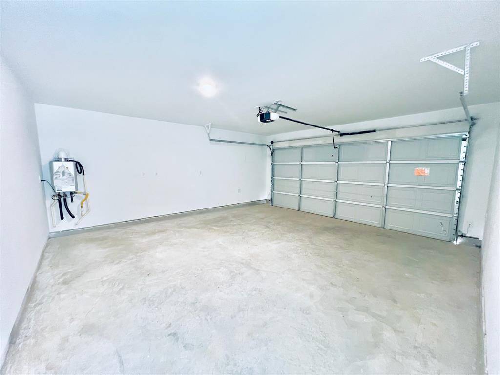 Garage includeds Tankless Water Heater