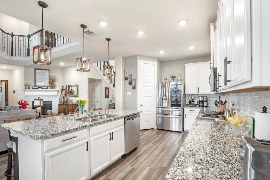 Granite counters, Wi-Fi controlled oven and plenty of cabinet space make this kitchen a chef's dream