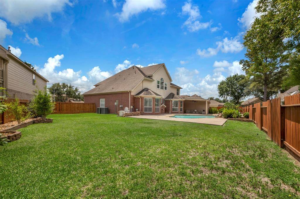 This property also offers some grass for our pets or kids to play on.