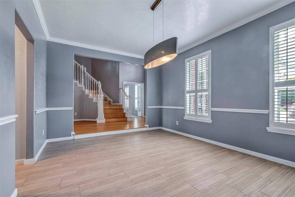 To the right of the entrance door is your study and to the left your formal dining.