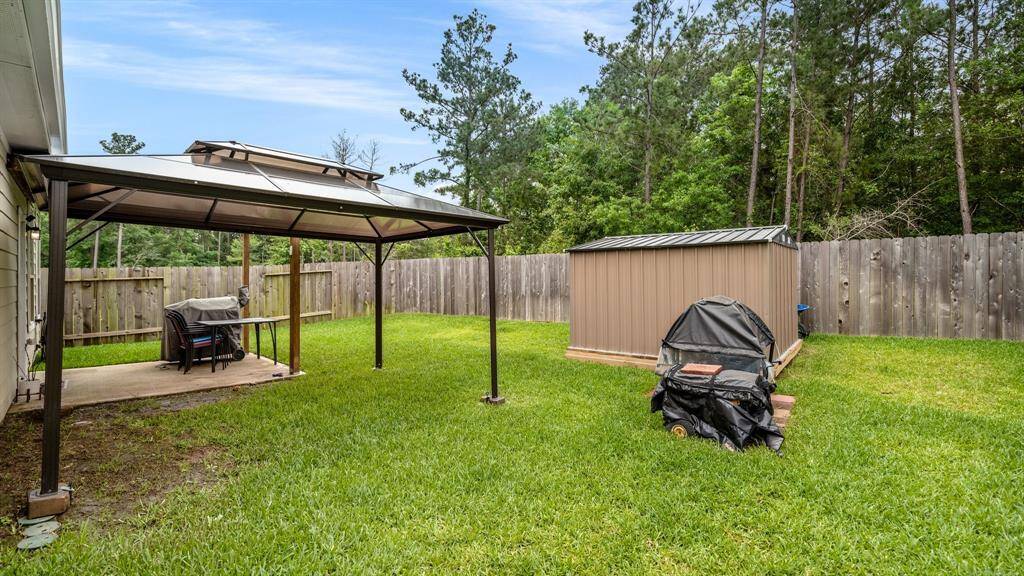 Backyard Covered Patio, Storage Shed, Gazebo, and Home Generator