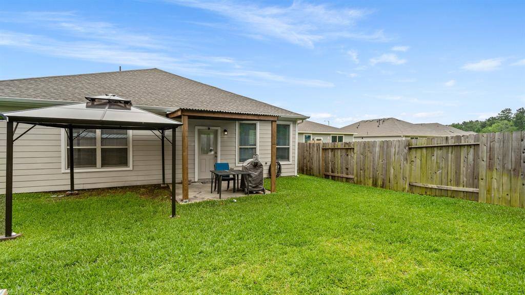 Backyard Covered Patio, Storage Shed and home Generator
