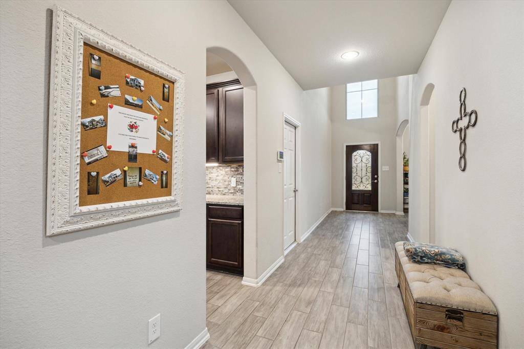 Large formal dining room as you enter the home. Keep it as a dining or entertain the idea to add french/barn doors and make it a perfect office with plenty of natural light. There is a nice size breakfast area right outside the kitchen it's own space.