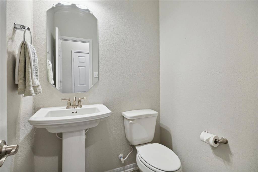 Large primary bedroom on the 1st floor with a view and it's own door to the patio.