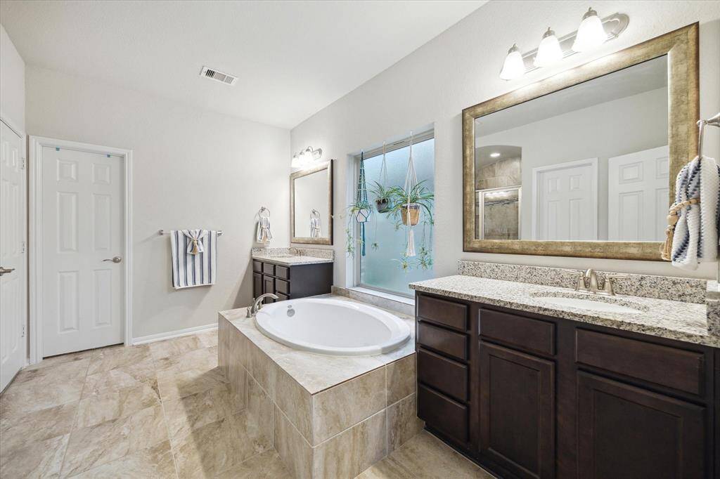 Great walk-in closet big enough for an oversized dresser and plenty of clothes, shoes or whatever else you may have.