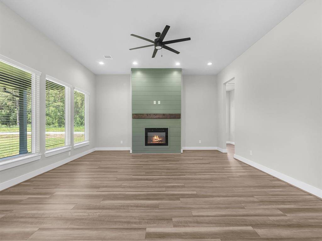 Natural lighting flows into the living area. Comfortable, yet spacious design in the family room