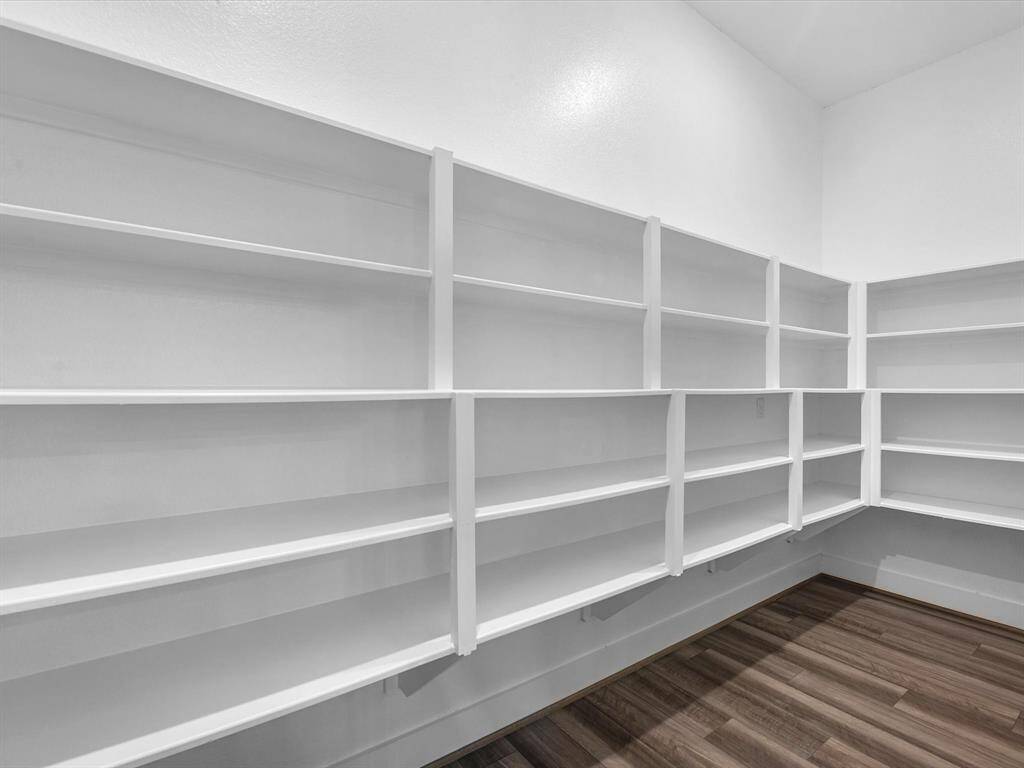 This walk-in pantry leaves no desire for more space!