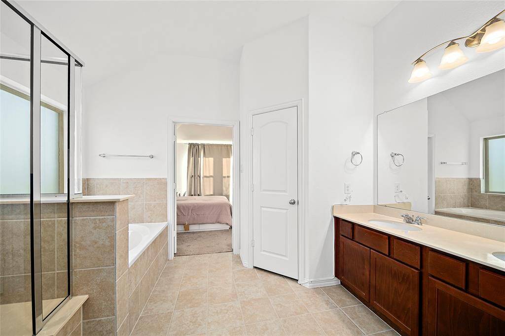 Shower and bathtub and double sink