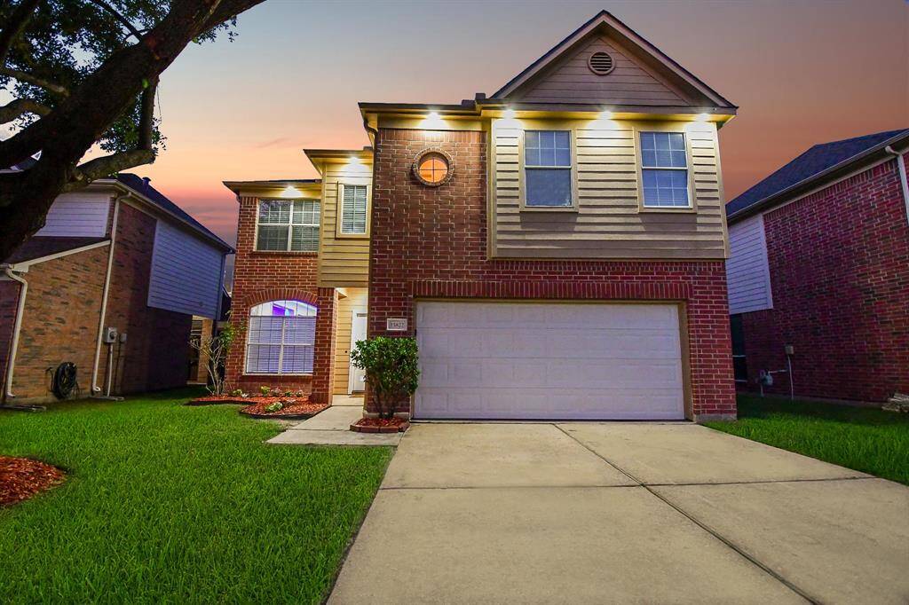 Evening views of the stunning 15822 Land View Dr!
