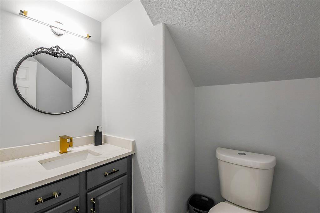 Convenient half bathroom located near the garage!