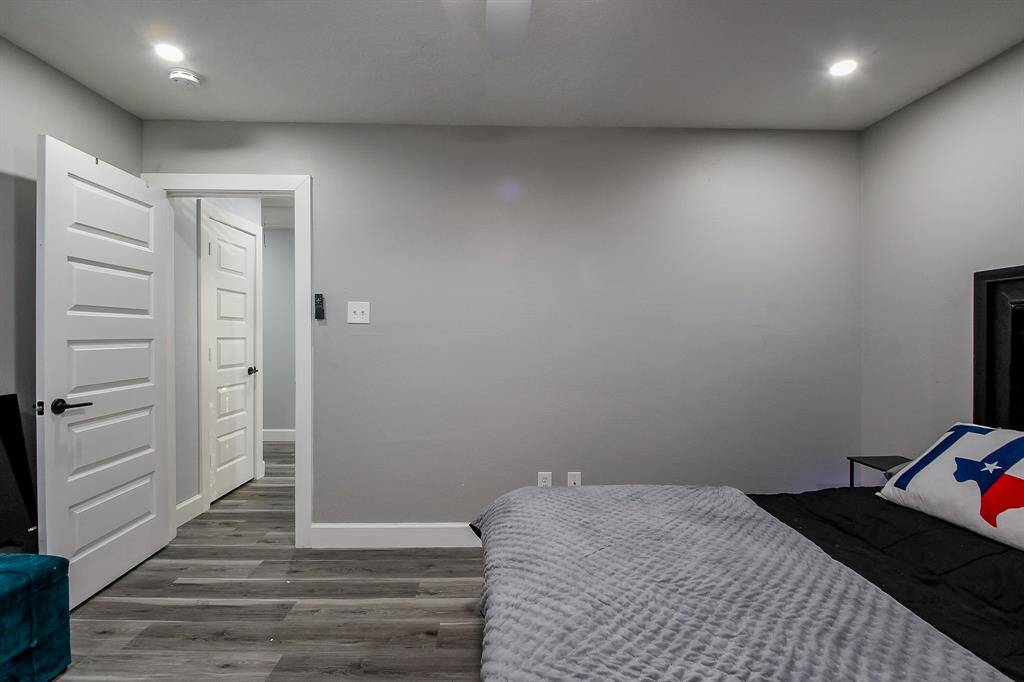 Another view of the 4th  bedroom featuring recessed lighting and a ceiling fan!