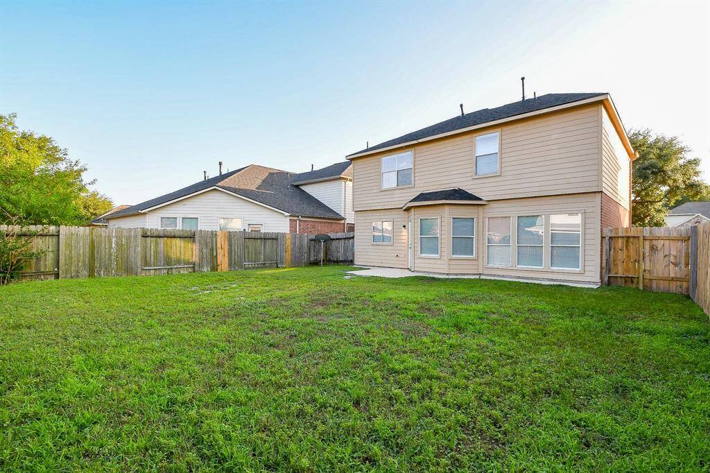 Very spacious backyard waiting for you to make it your own!