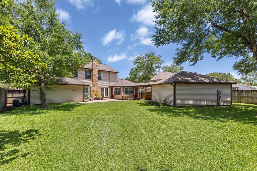 Spacious backyard is perfect for gardening (grapevine included) or relaxing!