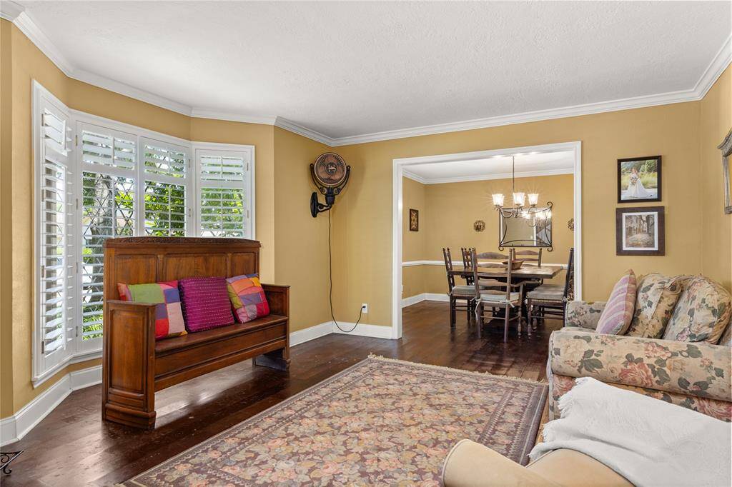 Formal living flows seamlessly into formal dining