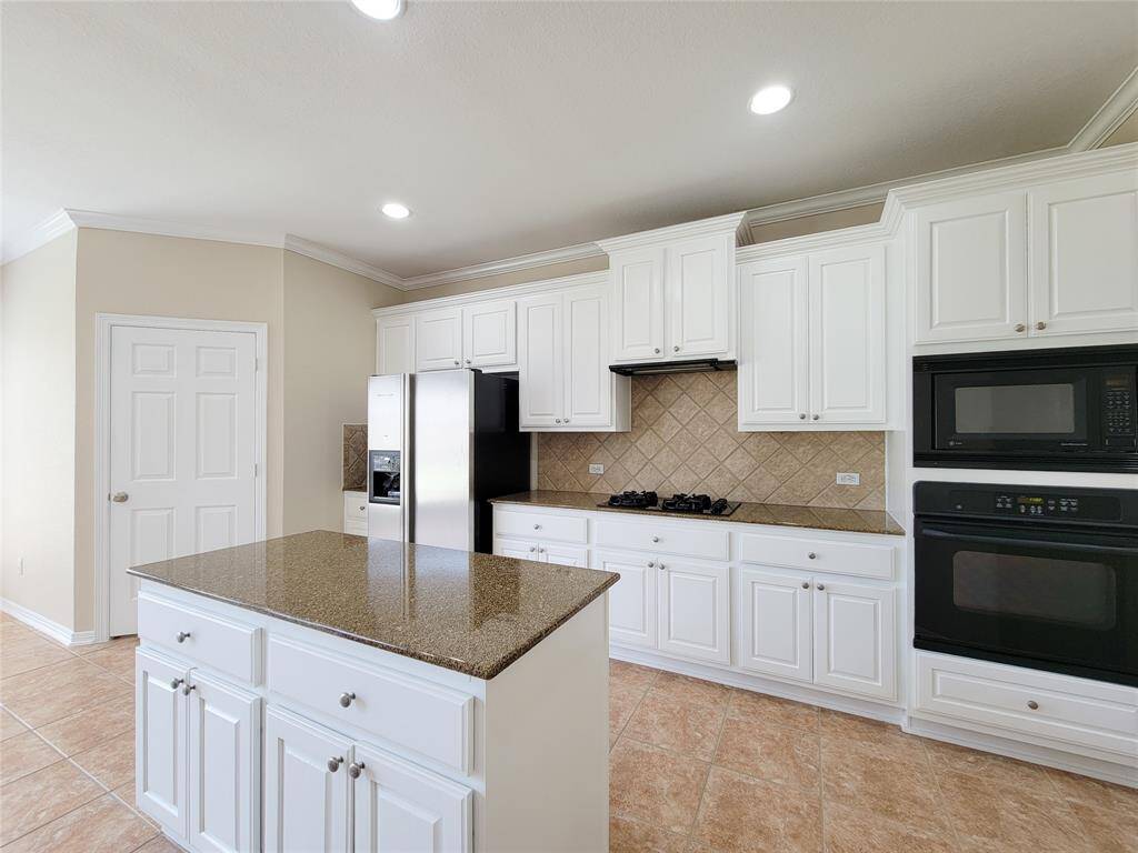 Another view of the spacious Kitchen.