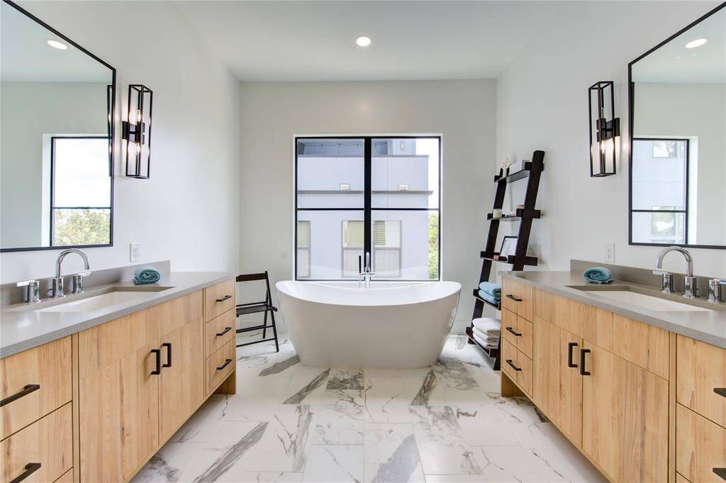 Dual vanities and large soaking tub make this an oasis to relax.