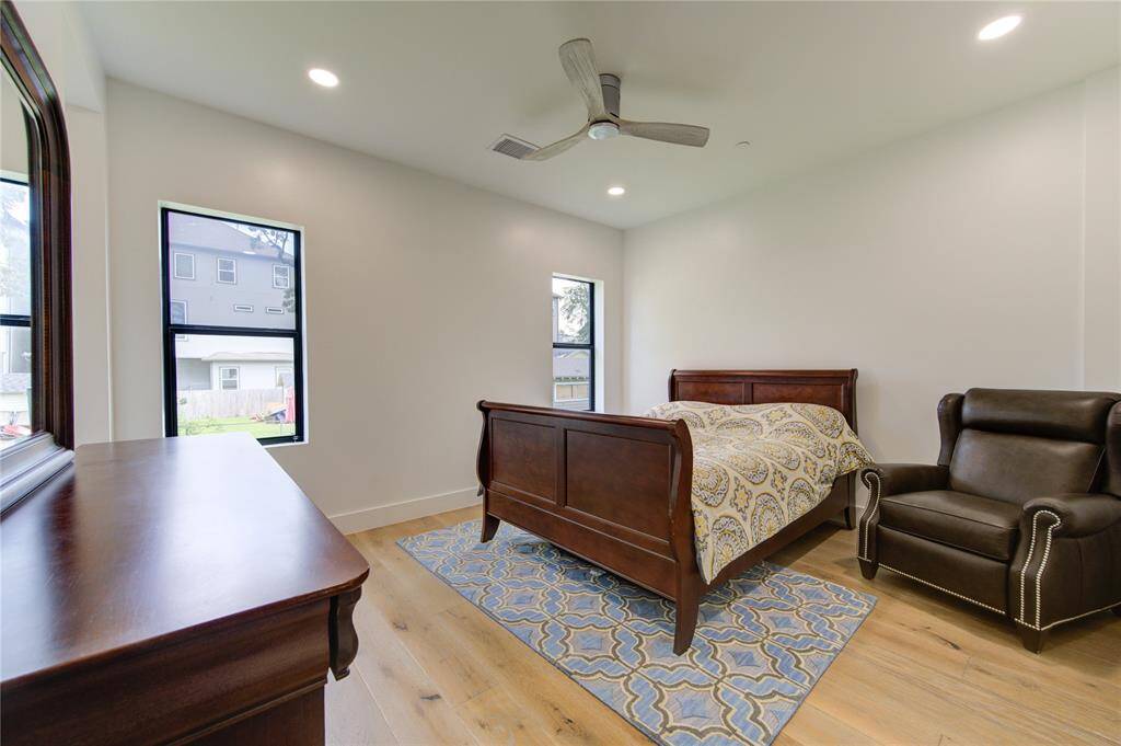Bedroom on 1st floor with walk-in closet and private bath.