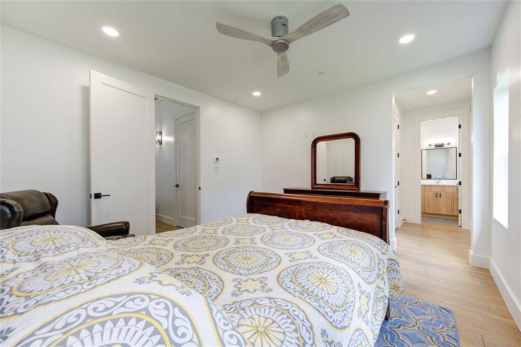 Bedroom on 1st floor with walk-in closet and private bath.