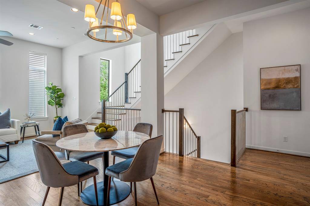 The dining area allows for extra seating in this open space that leads to the family room.