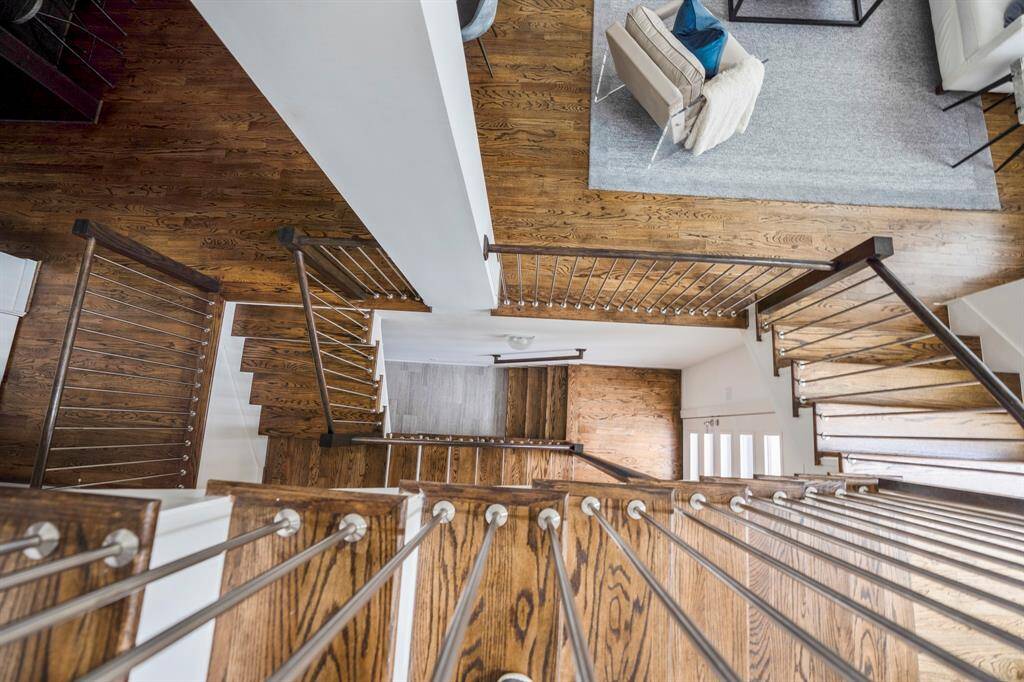 These grand stairs lead you to the third level where you will find the primary bedroom and a walk-in laundry room.