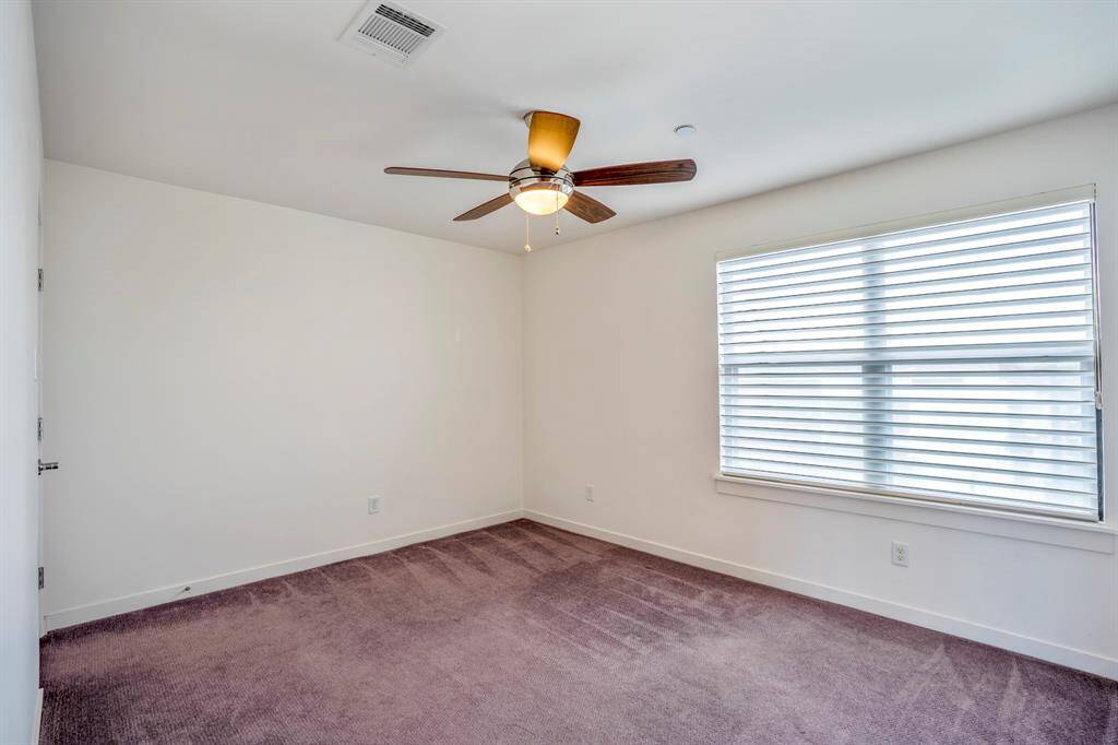 Third bedroom located off the game room features a large walk-in closet.